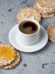 healthy and delicious Breakfast. freshly brewed coffee and rice cakes with maple syrup