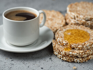 healthy and delicious Breakfast. freshly brewed coffee and rice cakes with maple syrup