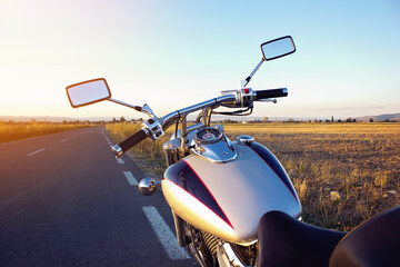 Motorcycle at sunset colors.Outdoor photography. Travel and sport, speed and freedom concept