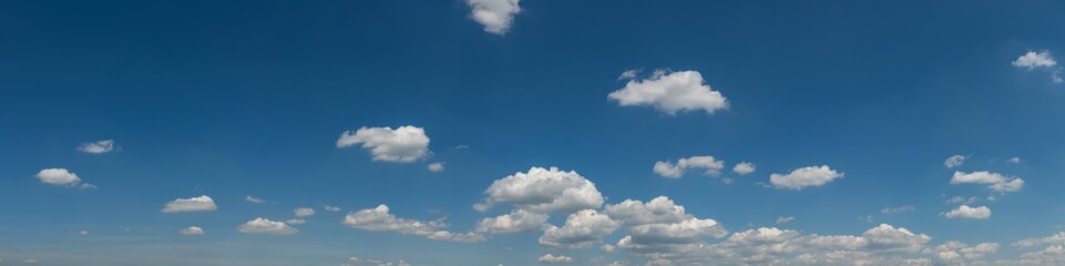 Naklejka na ściany i meble panorama white clouds on blue sky