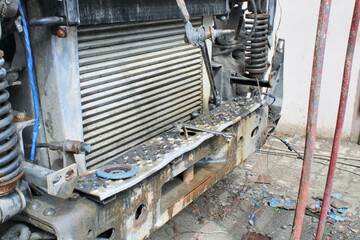 Repair of the car MAZ.Grid of the car's radiator.