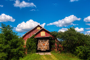 Red Barn with Hay Wagon  and Blue Skies in Windsor NY