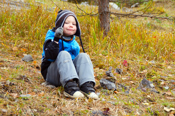 boy in autumn park