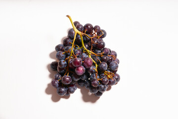 A bunch of grapes on white background