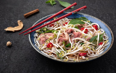 meat and vegetable Vietnam noodle with chopstick food background