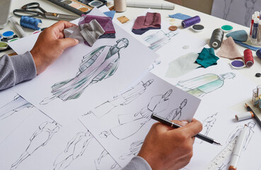 Fashion designer stylish drawings sketches textile fabric material Costume. Designer creative workshop studio.