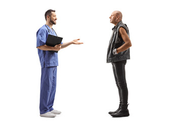 Medical worker talking to a bald punk rocker