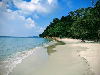 tropical beach with blue sky
