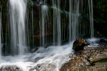 longexposure of a waterfall at Griessbach Falls in Berner Oberland