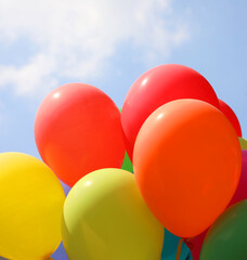 party with colorful balloons and blue sky