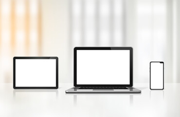 Fototapeta premium Laptop, mobile phone and digital tablet pc on office desk