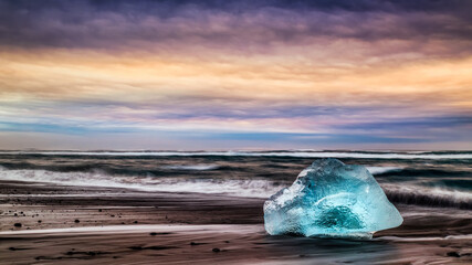 ice floes on the black sea sand and the coast