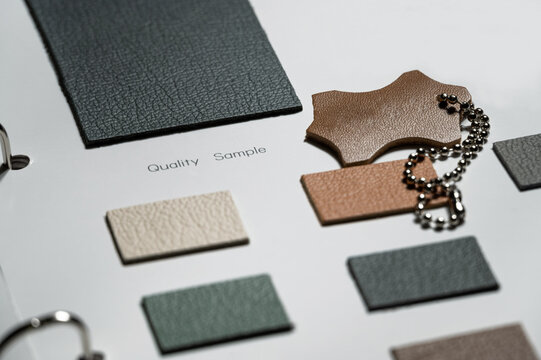 Leather Swatch Book With Various Different Colors.