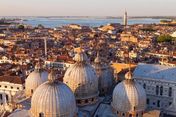 Fototapeta premium Panoramic view of Venice, Italy. A bird's eye view of the domes of the Cathedral of San Marco.