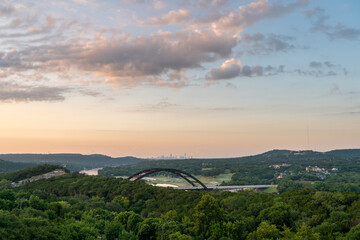 Wide Angle View of the Austin 360 Bridge With Lake Austin and Downtown Austin in the Background