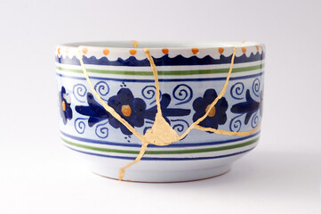 Vintage Italian pottery restored with kintsugi technique.