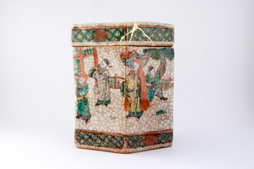 Chine kintsugi ceramic urn restored with real gold. Antique pottery kintsukuroi.