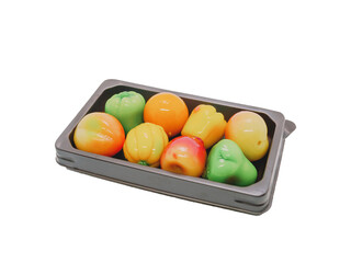 Fruit Shaped Mung Beans or Thai Kanom Look Choup in a brown plastic box On a white background with isolate background