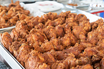 Asia Fried Chicken food street style in aluminum tray for sales.