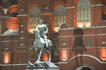 Fototapeta na wymiar Photo of buildings of the Kremlin and Red Square in Moscow taken during a snowstorm at night