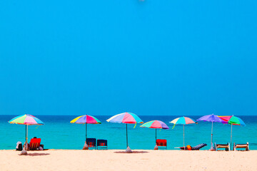 Umbrellas on the sandy beach in summer