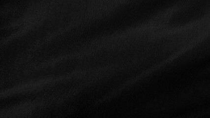 beautiful black textile cloth background. detail of wavy black opaque fabric background.