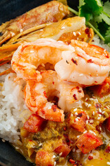 Asian dish curry with langoustines and hikari rice