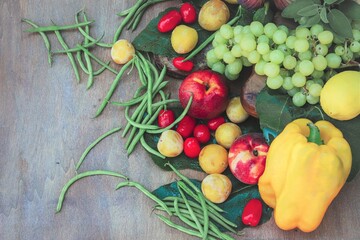 closeup of a top view fruit and vegetable composition - fresh and healthy food