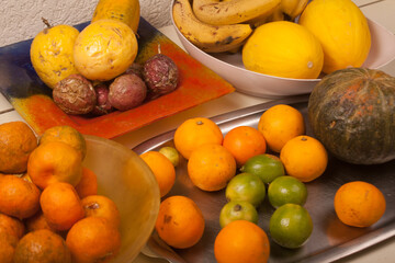 banana, melon, tangerine, passion fruit, papaya, pumpkin, lemon, orange