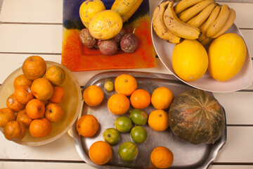 banana, melon, tangerine, passion fruit, papaya, pumpkin, lemon, orange