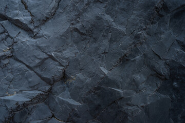 Black rock surface Textures and backgrounds - 369723397