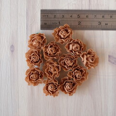 Artificial flowers made out of fabric in beautiful pastel brown color. This handmade flower can be used as decoration on headband, dress, and many other as craft supply material.