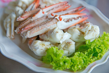 Close up blue crab steamed with Lettuce.
