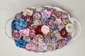 Artificial flowers made out of fabric in beautiful pastel colors