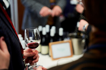 man and woman drinking wine