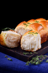 Golden pampushki with herbs and garlic. Ukrainian cuisine buns	