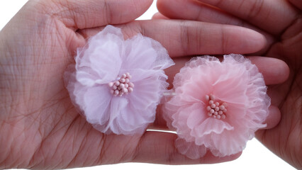 Artificial flowers made out of organza fabric in beautiful and pastel color