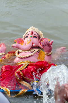 Ganesha idol in water for immersion