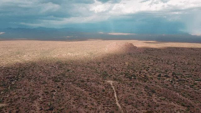 Arizona desert rain showers over dry landscape,USA.