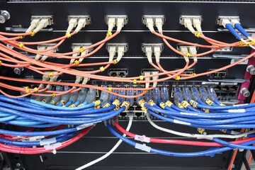 cable network, fiber optic cable connect to switch port in server room ,Concept network management