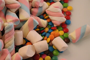 Different sweets decorating a beautiful party table.