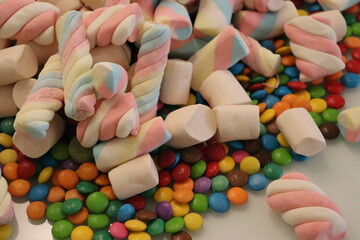 Different sweets decorating a beautiful party table.