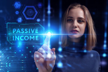 Business, Technology, Internet and network concept. Young businessman working on a virtual screen of the future and sees the inscription: Passive income