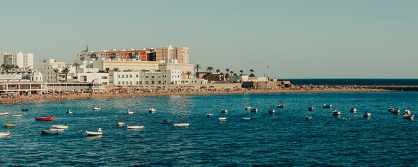 Panoramic of port town in the sea. © Manel Ponce
