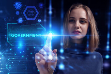 Business, Technology, Internet and network concept. Young businessman working on a virtual screen of the future and sees the inscription: Government