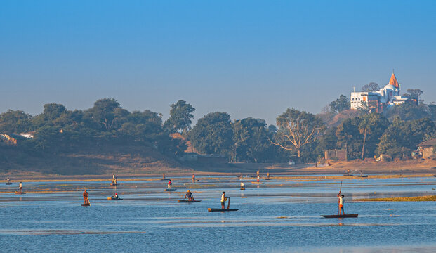 Fishermen catching fish at lake in Dhar city of madhya pradesh state. India.