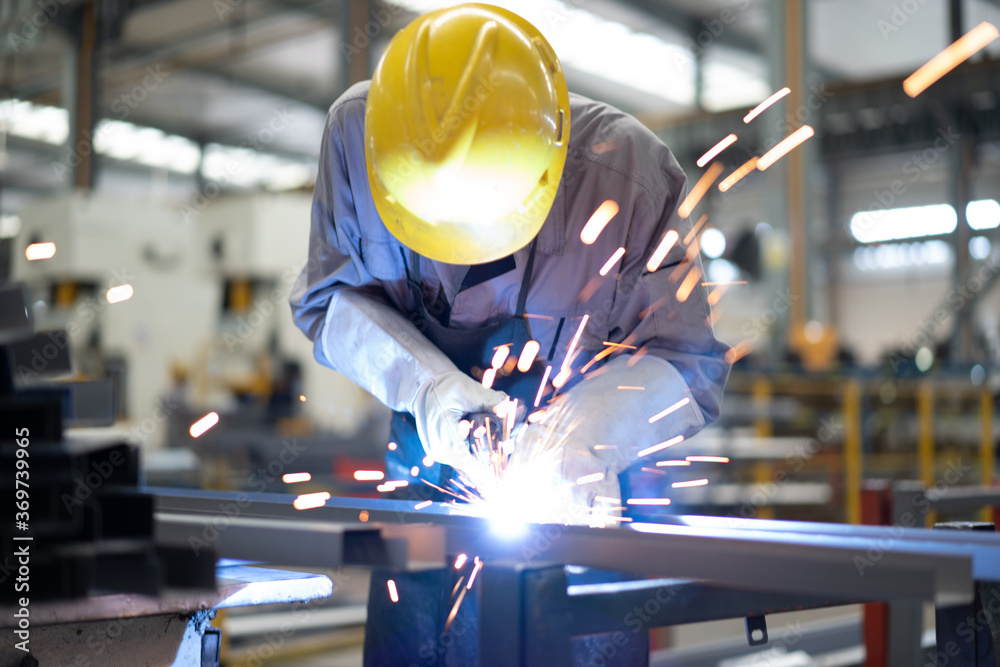 Poster worker working in factory	