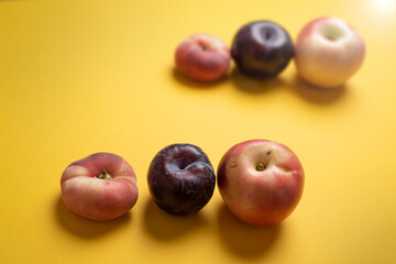 Kernel summer fruits focused and blurred on yellow
