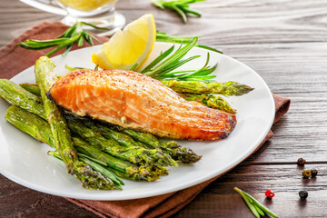 Delicious lunch, baked salmon with asparagus