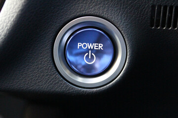 Blue POWER button in a hybrid vehicle
